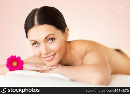 picture of woman in spa salon lying on the massage desk. woman in spa