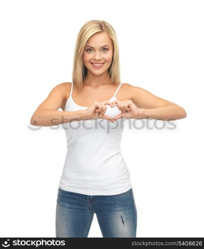 picture of woman in white tank showing heart shape with hands