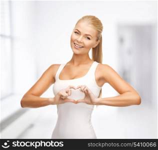 picture of woman showing heart shape gesture