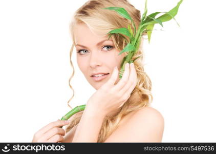 picture of woman with bamboo over white