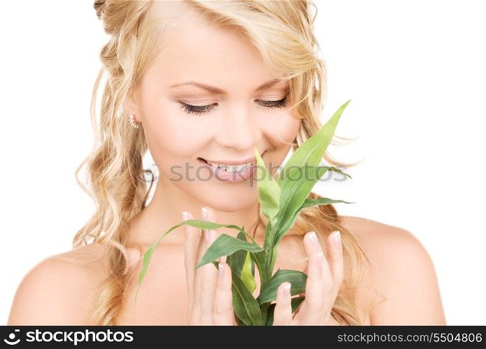 picture of woman with bamboo over white