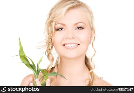 picture of woman with bamboo over white