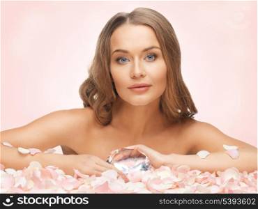 picture of woman with big diamond and rose petals