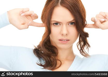 picture of woman with fingers in ears