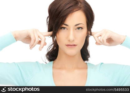 picture of woman with fingers in ears