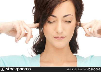 picture of woman with fingers in ears