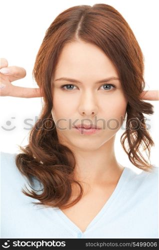 picture of woman with fingers in ears.