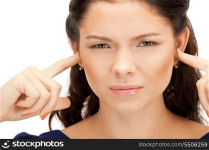 picture of woman with fingers in ears