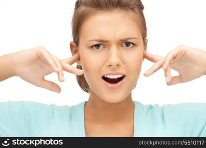 picture of woman with fingers in ears