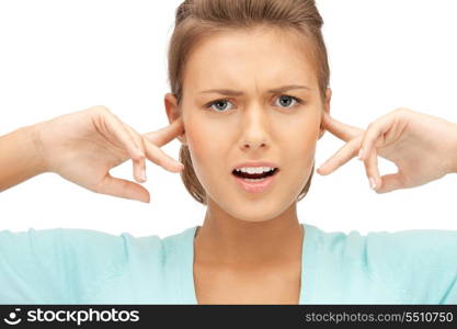 picture of woman with fingers in ears