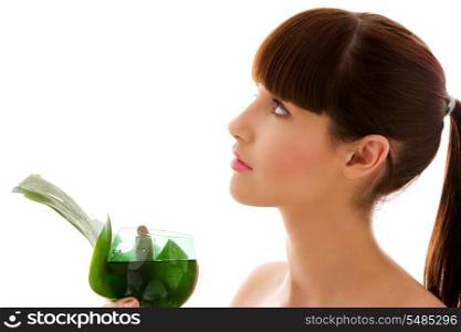 picture of woman with green leaf and glass of water