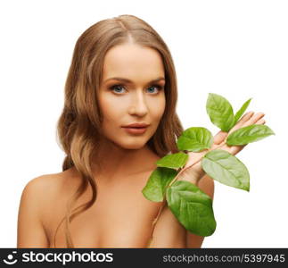 picture of woman with green leaf over white.