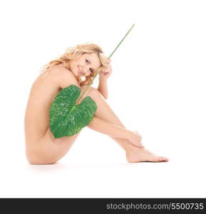 picture of woman with green leaf over white