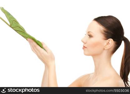 picture of woman with green leaf over white&#x9; &#xA;