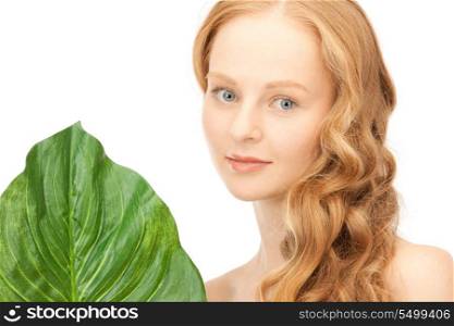 picture of woman with green leaf over white&#xA;
