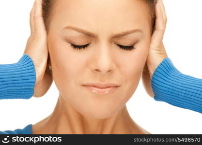 picture of woman with hands on ears