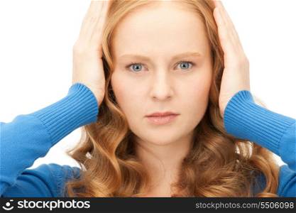picture of woman with hands on ears