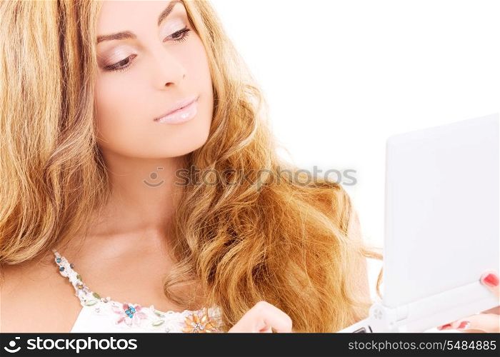 picture of woman with laptop computer over white