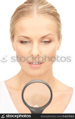 picture of woman with magnifying glass over white