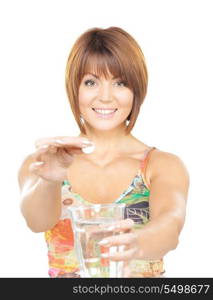 picture of woman with pill and glass of water