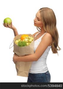 picture of woman with shopping bag full of fruits