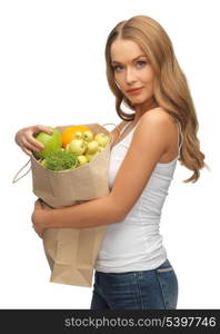 picture of woman with shopping bag full of fruits