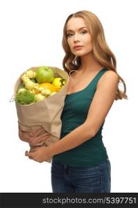 picture of woman with shopping bag full of fruits