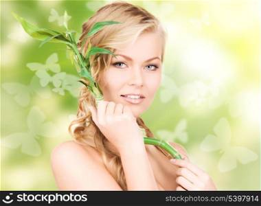 picture of woman with sprout over green background