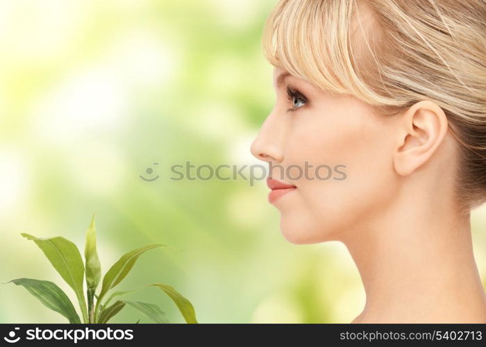 picture of woman with sprout over green background