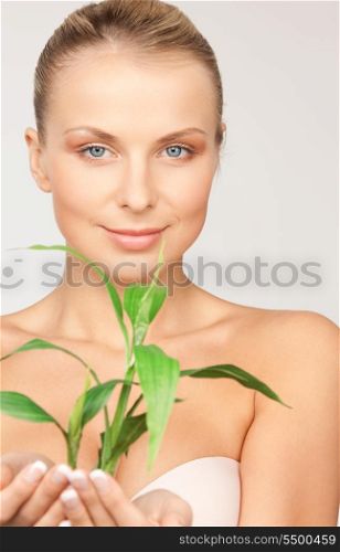 picture of woman with sprout over grey