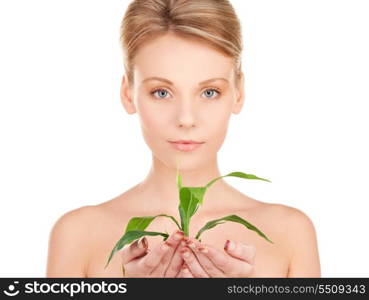 picture of woman with sprout over white