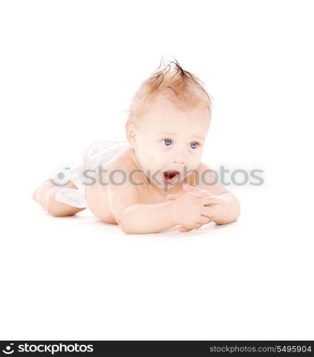picture of yawning baby boy in diaper over white