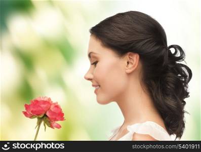 picture of young and beautiful woman with flower