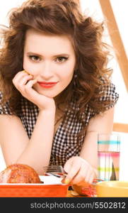 picture of young attractive woman in the kitchen