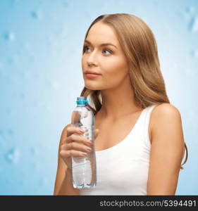 picture of young beautiful woman with bottle of water