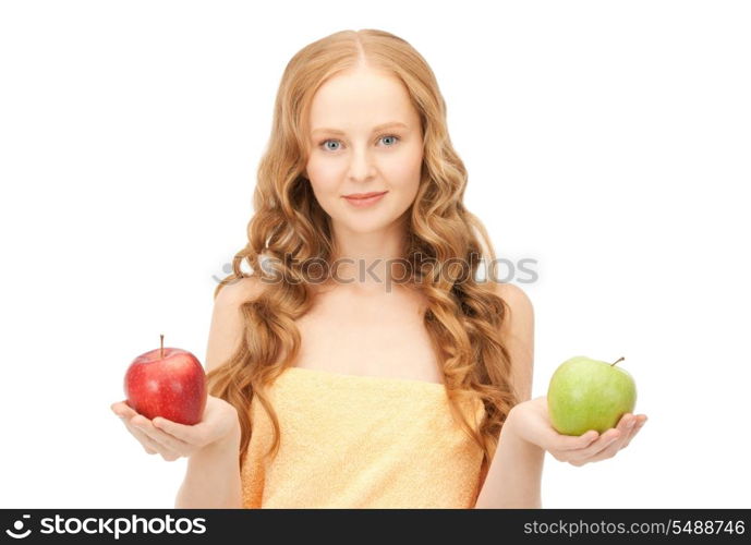 picture of young beautiful woman with green and red apples