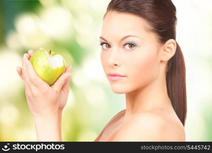 picture of young beautiful woman with green apple.