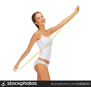 picture of young beautiful woman with measure tape