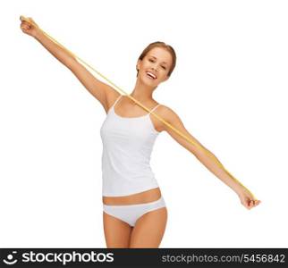 picture of young beautiful woman with measure tape