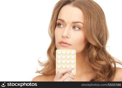 picture of young beautiful woman with pills
