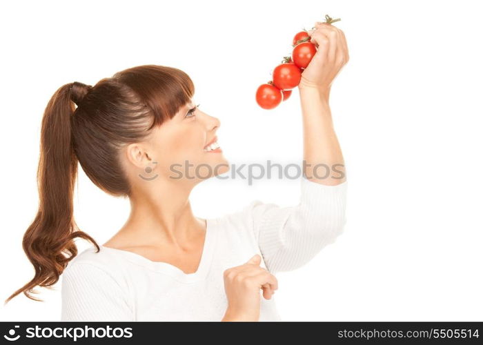 picture of young beautiful woman with ripe tomatoes