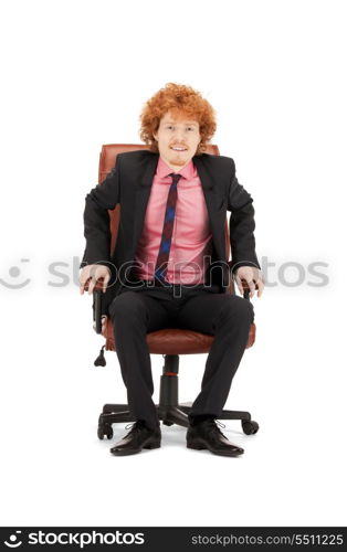 picture of young businessman sitting in chair