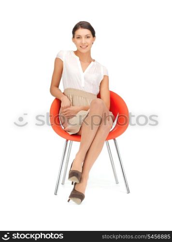 picture of young businesswoman sitting in chair