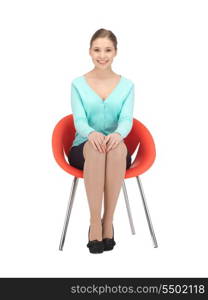 picture of young businesswoman sitting in chair