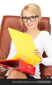 picture of young businesswoman with folders sitting in chair&#x9; &#xA;