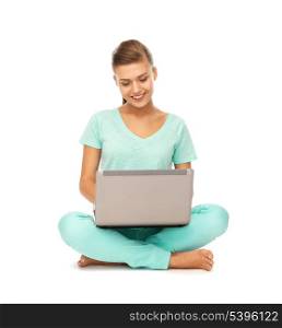 picture of young girl sitting on the floor with laptop
