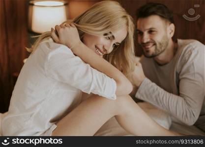 Picture of young loving couple enjoy in bed