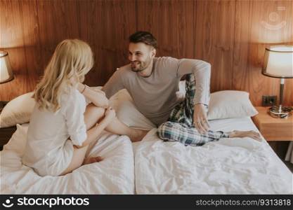 Picture of young loving couple enjoy in bed