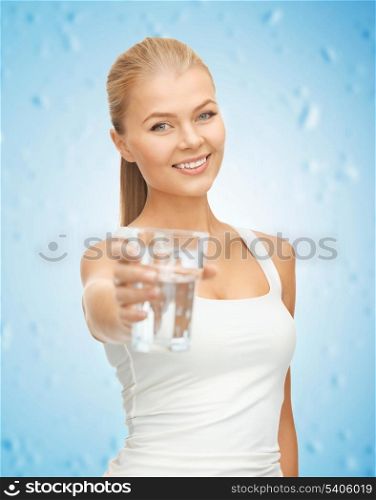 picture of young smiling woman with glass of water