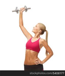 picture of young sporty woman lifting steel dumbbell